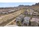 Stunning aerial of homes and neighborhood, complemented by mountain scenery at 2367 Ridgeline Wash St, Las Vegas, NV 89138