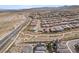 High angle view of Crested Canyon showcasing homes and community features against mountain backdrop at 2367 Ridgeline Wash St, Las Vegas, NV 89138