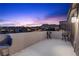 Enjoy the evening on the balcony with seating and stunning views of the mountain and city lights at 2367 Ridgeline Wash St, Las Vegas, NV 89138