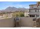 Enjoy breathtaking mountain views from this inviting balcony with comfortable seating at 2367 Ridgeline Wash St, Las Vegas, NV 89138