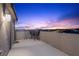 Relax on the balcony with comfortable seating and take in the beautiful city skyline in the distance at 2367 Ridgeline Wash St, Las Vegas, NV 89138