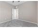Empty bedroom with neutral walls, soft carpet, and ceiling fan at 2367 Ridgeline Wash St, Las Vegas, NV 89138