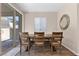 Cozy dining area featuring natural light and a view of the backyard at 2367 Ridgeline Wash St, Las Vegas, NV 89138