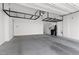 Spacious garage with ample storage shelving and room for multiple vehicles at 2367 Ridgeline Wash St, Las Vegas, NV 89138