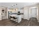 Bright kitchen with stainless steel appliances, a large island, pendant lighting, and modern backsplash at 2367 Ridgeline Wash St, Las Vegas, NV 89138