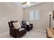 Cozy sitting area with two leather recliners, offering a comfortable and relaxing space at 2367 Ridgeline Wash St, Las Vegas, NV 89138