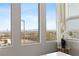 Scenic view of the city and mountains from the window with an orchid in the foreground at 2367 Ridgeline Wash St, Las Vegas, NV 89138