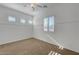 Bright bedroom with plantation shutters for natural light and wall trim at 2470 Lothian St, Henderson, NV 89044