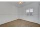 Neutral-toned bedroom with carpet, a ceiling fan, and window with shutter blinds for light control at 2470 Lothian St, Henderson, NV 89044