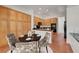 Bright dining area with wooden cabinets, a round table, and seating for four at 2470 Lothian St, Henderson, NV 89044