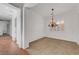Inviting dining room featuring a chandelier and neutral tones, ready for Gathering gatherings and entertaining at 2470 Lothian St, Henderson, NV 89044