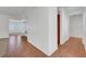 Bright hallway with white walls, tiled floor, and an open floorplan at 2470 Lothian St, Henderson, NV 89044