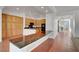 Gourmet kitchen boasts abundant cabinetry, granite countertops, and modern appliances at 2470 Lothian St, Henderson, NV 89044