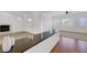 Open-concept living room featuring tile and carpet flooring, natural light, and modern architectural details at 2470 Lothian St, Henderson, NV 89044