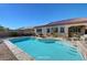Virtually Staged: Backyard pool with a built-in spa and desert landscaping, adjacent to the home at 2470 Lothian St, Henderson, NV 89044