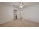 Neutral bedroom with carpet, ceiling fan, and closet at 2636 Ontario Dr, Las Vegas, NV 89128