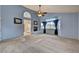 Open living space with a fireplace, large windows, and seamless access to the en suite bath at 2636 Ontario Dr, Las Vegas, NV 89128