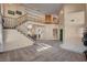 Bright living room featuring a staircase, high ceilings, and an open floor plan at 2636 Ontario Dr, Las Vegas, NV 89128