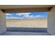 A covered back patio offers stunning views of the surrounding desert landscape at 2900 W Jaybird St, Pahrump, NV 89048