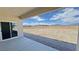 A covered patio has views of the extensive desert landscape at 2900 W Jaybird St, Pahrump, NV 89048