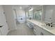 Bright primary bathroom featuring soaking tub, dual sinks, and luxurious shower at 2900 W Jaybird St, Pahrump, NV 89048