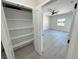 View from walk-in closet into the bedroom, showing closet storage and room access at 2900 W Jaybird St, Pahrump, NV 89048
