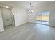 Open dining area with a sliding door and neutral tones, perfect for entertaining or Gathering meals at 2900 W Jaybird St, Pahrump, NV 89048