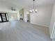 Bright, open living room featuring fireplace and ample space for Gathering and guests at 2900 W Jaybird St, Pahrump, NV 89048