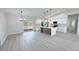 Spacious living area with a modern kitchen and seamless indoor-outdoor transition at 2900 W Jaybird St, Pahrump, NV 89048