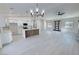 Open-concept living area combining kitchen, dining, and living spaces for seamless interaction and flow at 2900 W Jaybird St, Pahrump, NV 89048
