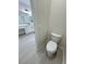 Stylish powder room adjacent to bathroom featuring modern fixtures and neutral paint at 2900 W Jaybird St, Pahrump, NV 89048