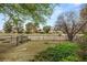 Backyard featuring a black fence and golf course in the background at 2935 Pinehurst Dr, Las Vegas, NV 89109