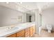 Bathroom featuring a double sink, a large mirror, and a shower/tub combination at 2935 Pinehurst Dr, Las Vegas, NV 89109