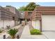 Inviting townhome exterior with tidy landscaping and a gated walkway to the front door at 2935 Pinehurst Dr, Las Vegas, NV 89109