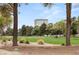 Scenic view of the lush golf course surrounded by mature trees at 2935 Pinehurst Dr, Las Vegas, NV 89109
