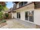 Patio area with a traditional Asian garden fixture and sliding glass doors at 2935 Pinehurst Dr, Las Vegas, NV 89109