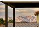 Stunning mountain views framed by the home's architecture, showcasing the natural beauty of the surrounding landscape at 365 Crown Mesa Ave, Las Vegas, NV 89138