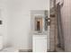 This bathroom features tiled shower, sink, mirror, and toilet at 3774 Decade St, Las Vegas, NV 89121