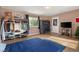 This bedroom has wood floors, a window, and closet space at 3774 Decade St, Las Vegas, NV 89121