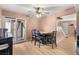 Inviting dining area with access to outdoor space, ideal for Gathering meals and gatherings at 3774 Decade St, Las Vegas, NV 89121