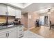 Modern kitchen featuring updated fixtures, ample counter space, and easy access to the dining area at 3774 Decade St, Las Vegas, NV 89121