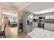 Well-equipped kitchen with stainless steel appliances, modern cabinets, and stylish flooring at 3774 Decade St, Las Vegas, NV 89121