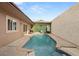 Backyard view of sparkling pool, perfect for relaxation and entertaining at 3774 Decade St, Las Vegas, NV 89121