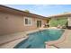 Capture of the refreshing pool with surrounding patio and outdoor furnishings at 3774 Decade St, Las Vegas, NV 89121