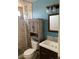 Upgraded bathroom featuring stylish fixtures and a beautifully tiled walk-in shower at 4454 Bertram Ln, Las Vegas, NV 89147