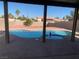 Inviting in-ground swimming pool, spa, and patio area, perfect for outdoor enjoyment and relaxation at 4454 Bertram Ln, Las Vegas, NV 89147