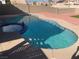 Beautiful backyard pool and spa with tanning ledge, perfect for relaxation and entertaining guests at 4454 Bertram Ln, Las Vegas, NV 89147