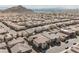 Aerial view of a residential neighborhood filled with neatly arranged homes and streets at 4576 Amazing View St, Las Vegas, NV 89129