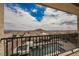 Balcony view of the pool with mountain views. Blue skies at 4576 Amazing View St, Las Vegas, NV 89129
