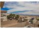 A picturesque view showcasing palm trees and city vista from the home's landscaped backyard at 4576 Amazing View St, Las Vegas, NV 89129